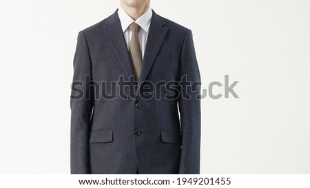 Man in business suit, isolated white background.