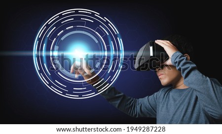 Young man using virtual reality headset. VR, future, technology online digital hi-tech technology design. concept innovation.