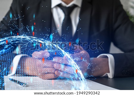 Businessman using on-line app on phone. social network icons hologram. Multiexposure. People connection concept.