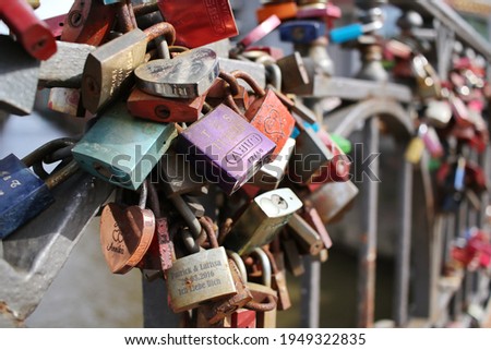 Rusty love locks on a bridge in the Hafencity, Hamburg
