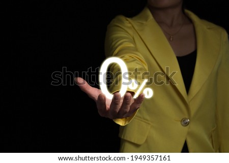 0% promotion on business women hand isolated on black background  
