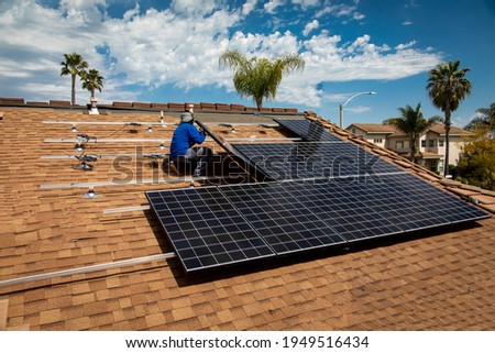 Installation of solar panels on a tile roof
