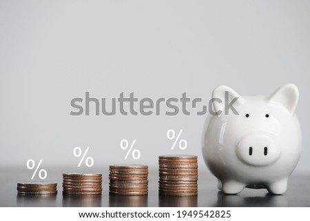 Interest rate financial and mortgage rates concept with icon percentage symbol on the coin. Balance savings and investment.