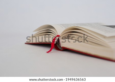 Open book on white background