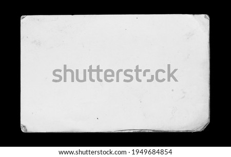 Grunge blank rectangle textured paper card isolated on black background