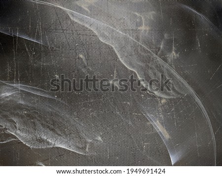 black and plastic cutting board close up photo texture and background