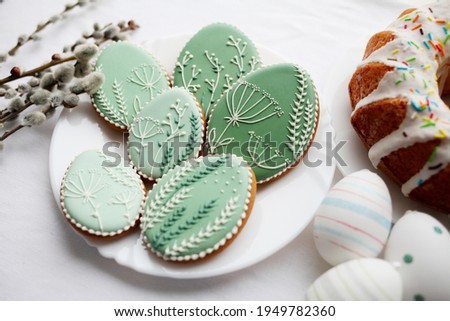 Easter gingerbread with icing on plateHappy Easter holiday background concept. 