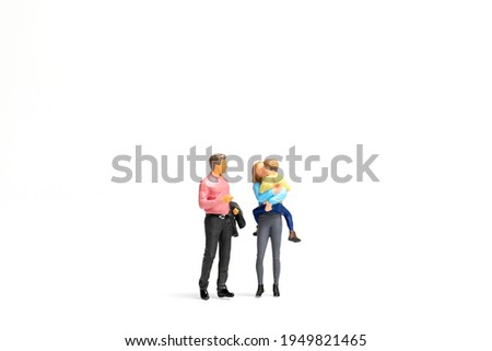 Miniature people Happy family standing on white background and copy space for text Royalty-Free Stock Photo #1949821465