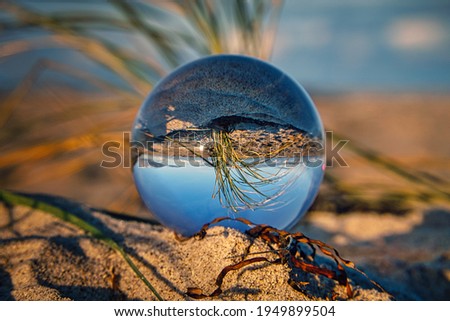 Glass ball on the beach of Zingst 