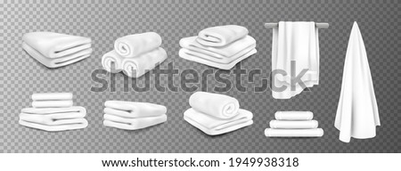 Bath towels. Realistic white hospital and hotel white bathroom hanging terry cloth. 3D fluffy fabric rolled and folded. Vector stack of textile toiletries set on transparent background Royalty-Free Stock Photo #1949938318