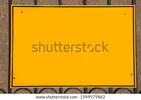 Blank rectangle yellow sign with black frame and copy space