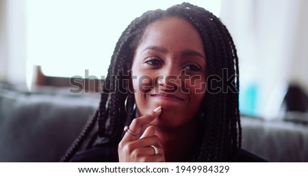 African girl thinking and finding solution idea to problem, thoughtful young woman