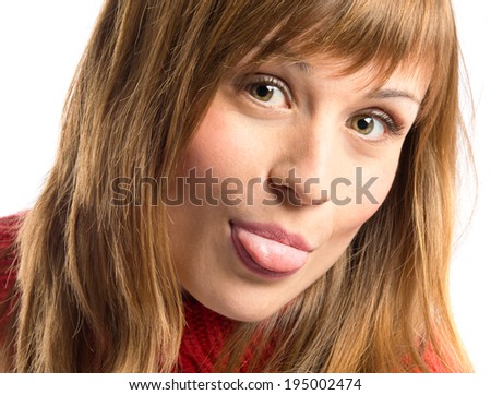 Young girl doing a joke over isolated white background 