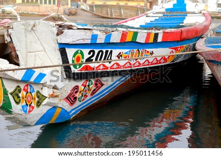 Painted canoes-Saint Louis du Senegal Royalty-Free Stock Photo #195011456