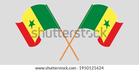 Crossed and waving flags of Senegal