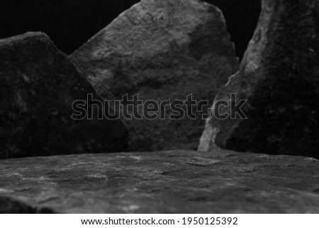 A Lower Foreground Rock Shelf with Middle Focus to the Horizontal Stage, with Blurred Standing Stones.  Royalty-Free Stock Photo #1950125392