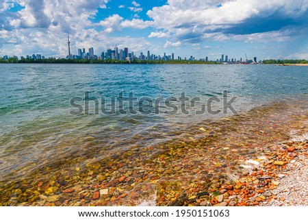 View of Toronto Shoreline from Tommy Thompson Park shores in Ontario Canada in summer