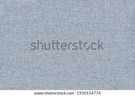 Light blue cotton woven sofa cushion fabric texture background. High resolution photography