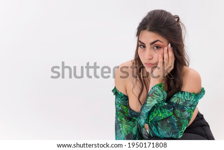 beautiful young model dancing on white background