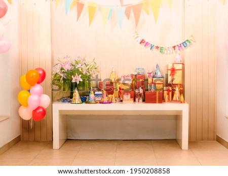 Blur image of Tables and decoration prepared for birhtday party for background usage.