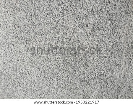 gray concrete wall cracks background 