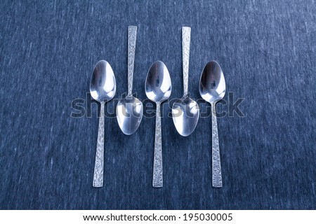 five spoons, design, blue background