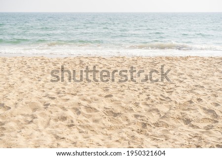 Sea and sand on tropical beach for vacation background.