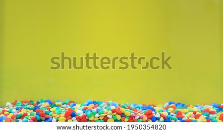 colored pebbles in the aquarium