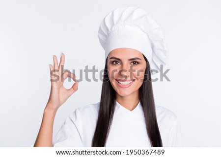Portrait of charming positive person fingers show okey symbol toothy smile isolated on white color background