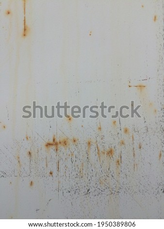 Metal rust wall with white 