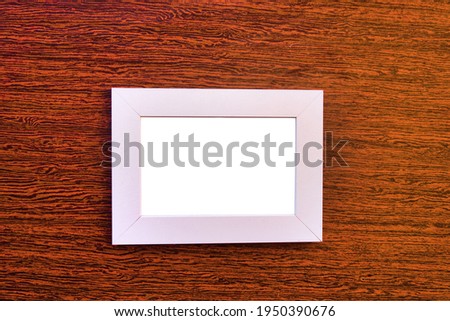 Classical interior and picture frame, Loft style design. Red wooden background