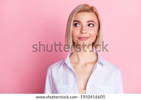 Photo of lovely dreamy charming woman look empty space dream imagine isolated on pastel pink color background