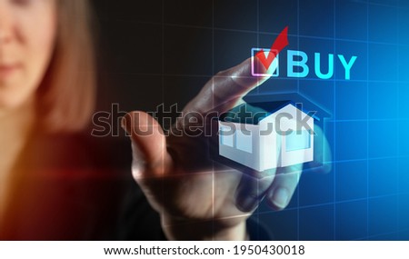 Purchase of real estate for investment purposes. Concept investor purchases real estate. Businesswoman wants to investment in real estate. Girl reaches for buy sign. Home sale logo on virtual screen
