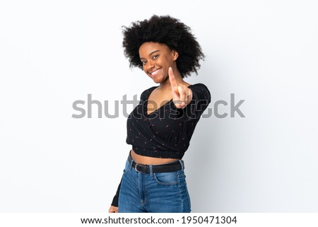 Young African American woman isolated on white background showing and lifting a finger