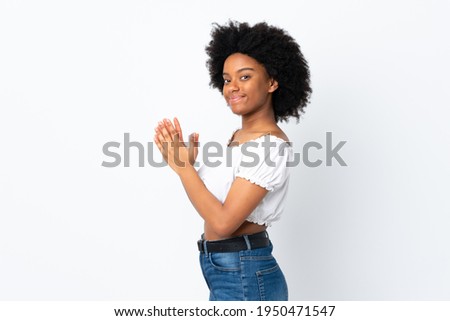 Young African American woman isolated on white background scheming something