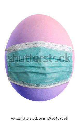 Large picture of an easter egg with rainbow colors and mask.