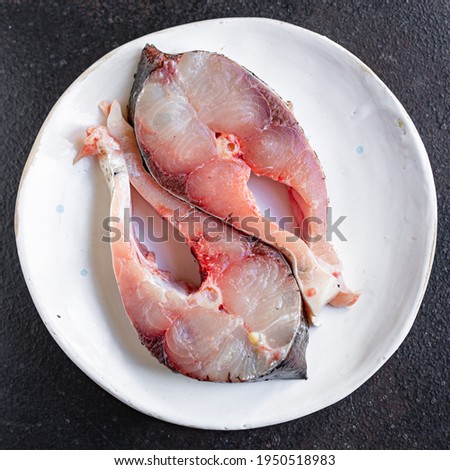 raw white fish steak silver carp seafood healthy food ready to cook snack vegetarian meal top view copy space background diet pescetarian