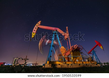 At night, oil pumps under the stars, Oil fields under the stars