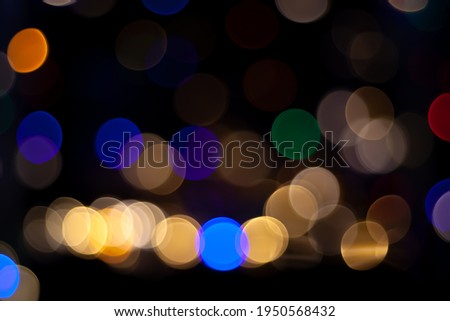 Abstract colourful glitter bokeh on circle theme background. 