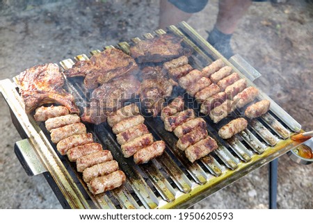 Meat being grilled on the barbecue
