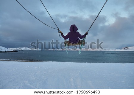 Beautiful woman with cup of tea on Swing. River on background, nature and calm. Self isolation.