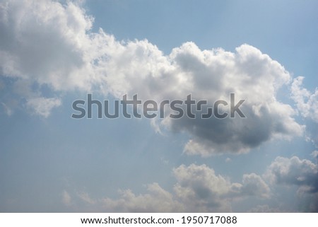 Scattered cloud clusters in a blue sky, blue sky background with white clouds, 