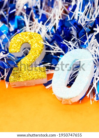 Number 20 celebration candle with tinsel 