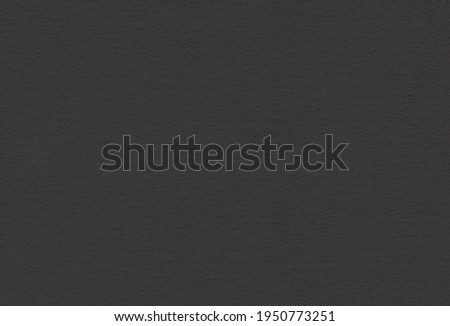 Close up view of black coloured creative uncoated paper background. Extra large highly detailed image.