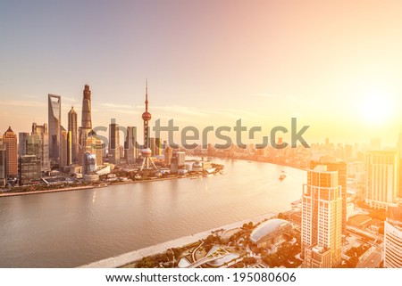 shanghai skyline and huangpu river with sunset glow Royalty-Free Stock Photo #195080606