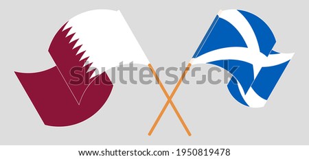 Crossed and waving flags of Qatar and Scotland
