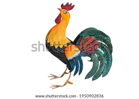 Splendid tin rooster sculpture.
Colorful crafted rooster with feathered tail.
