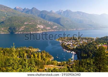 Kaslo is a village in the West Kootenay region of British Columbia, Canada, located on the west shore of Kootenay Lake. View from the Kaslo viewpoint trail head at the end of Wardner Street. Royalty-Free Stock Photo #1950906340
