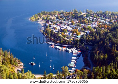 Kaslo is a village in the West Kootenay region of British Columbia, Canada, located on the west shore of Kootenay Lake. View from the Kaslo viewpoint trail head at the end of Wardner Street. Royalty-Free Stock Photo #1950906355
