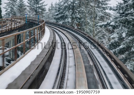 skytrain motion blur when it was turning on the snowy day
